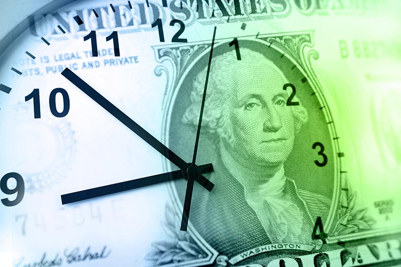 Image of a clock with money shaded into it.